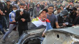 An Egyptian protester shouts on the third day of clashes with security forces at Tahrir Square in Cairo on November 21, 2011.  