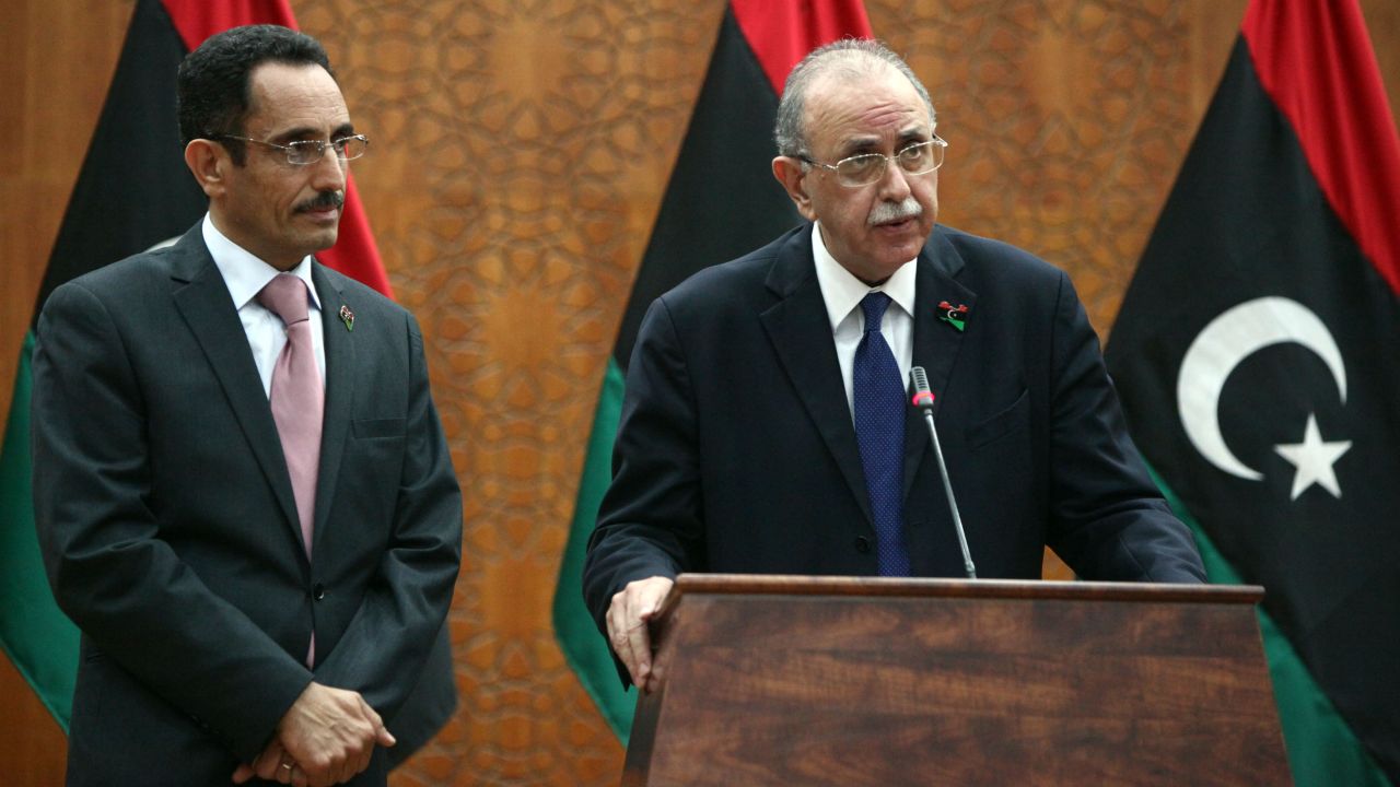 Libya's interim prime minister Abdel Rahim al-Kib announces his new cabinet line-up on November 22, 2011. 