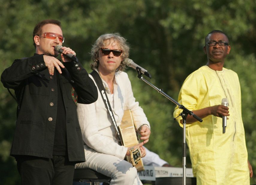 Senegal's Youssou N'Dour (right) has been one of Africa's leading and most recognizable musicians for more than two decades. Here he performs alongside rock legends Bono and Bob Geldof in Germany, 2007. 