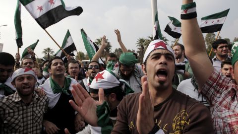 Pro-reform supporters protest outside the Arab League headquarters in the Egyptian capital Cairo on November 24, 2011.