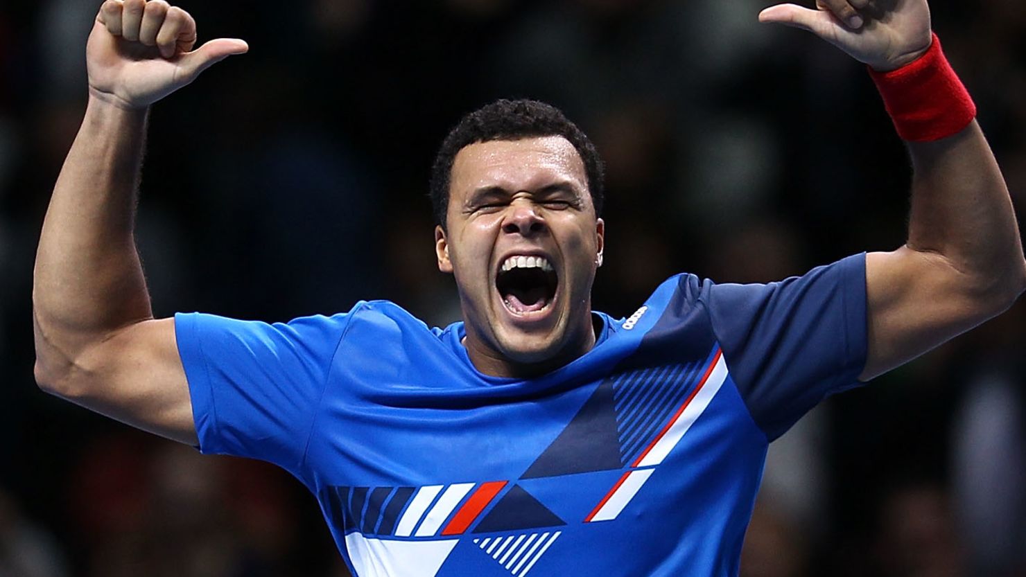 Jo-Wilfried Tsonga celebrates with his trademark victory dance after beating Rafael Nadal on Thursday.