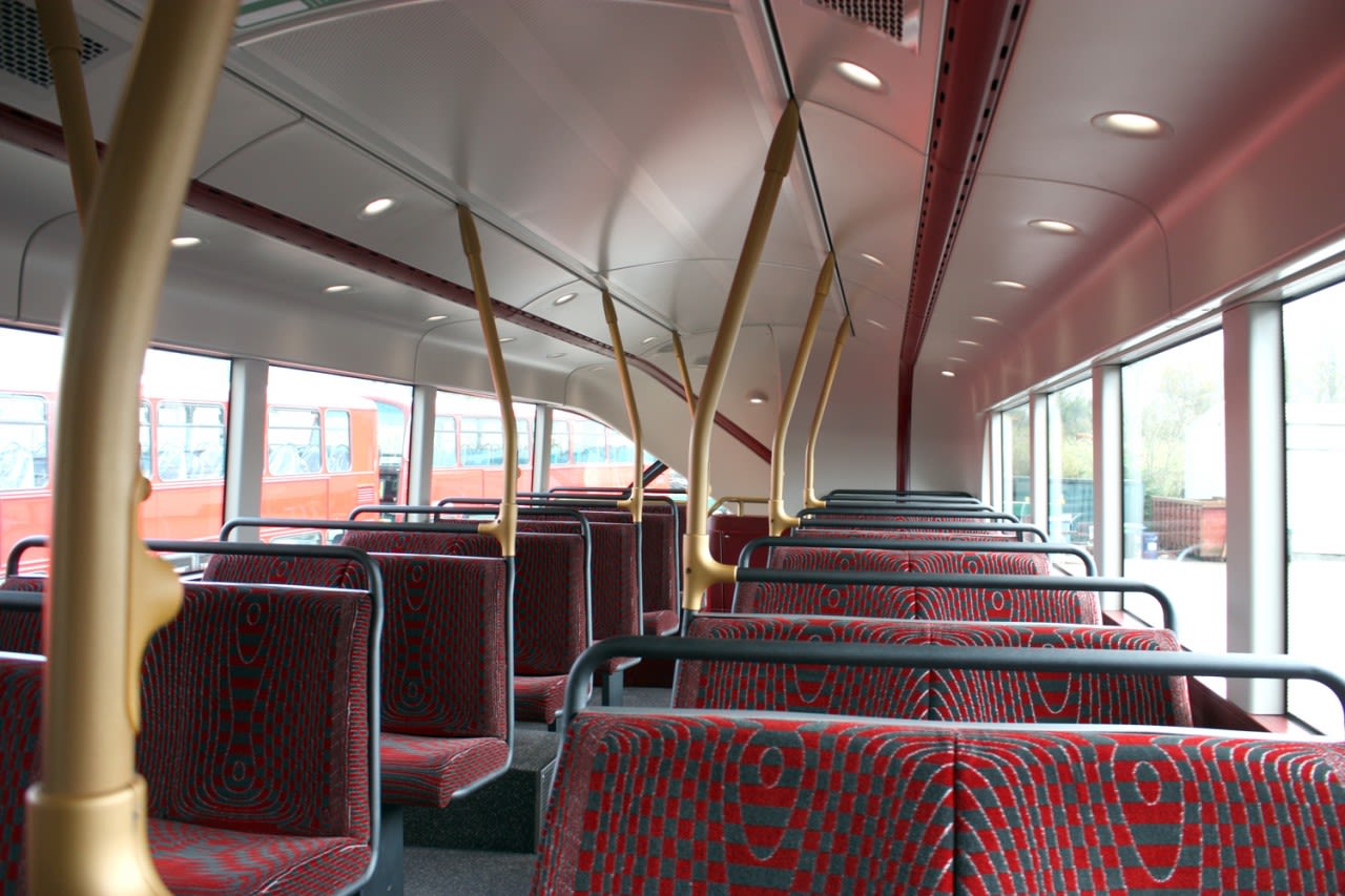 Upstairs, the same layout as the old Routemaster has been retained but with improved spot lighting. 