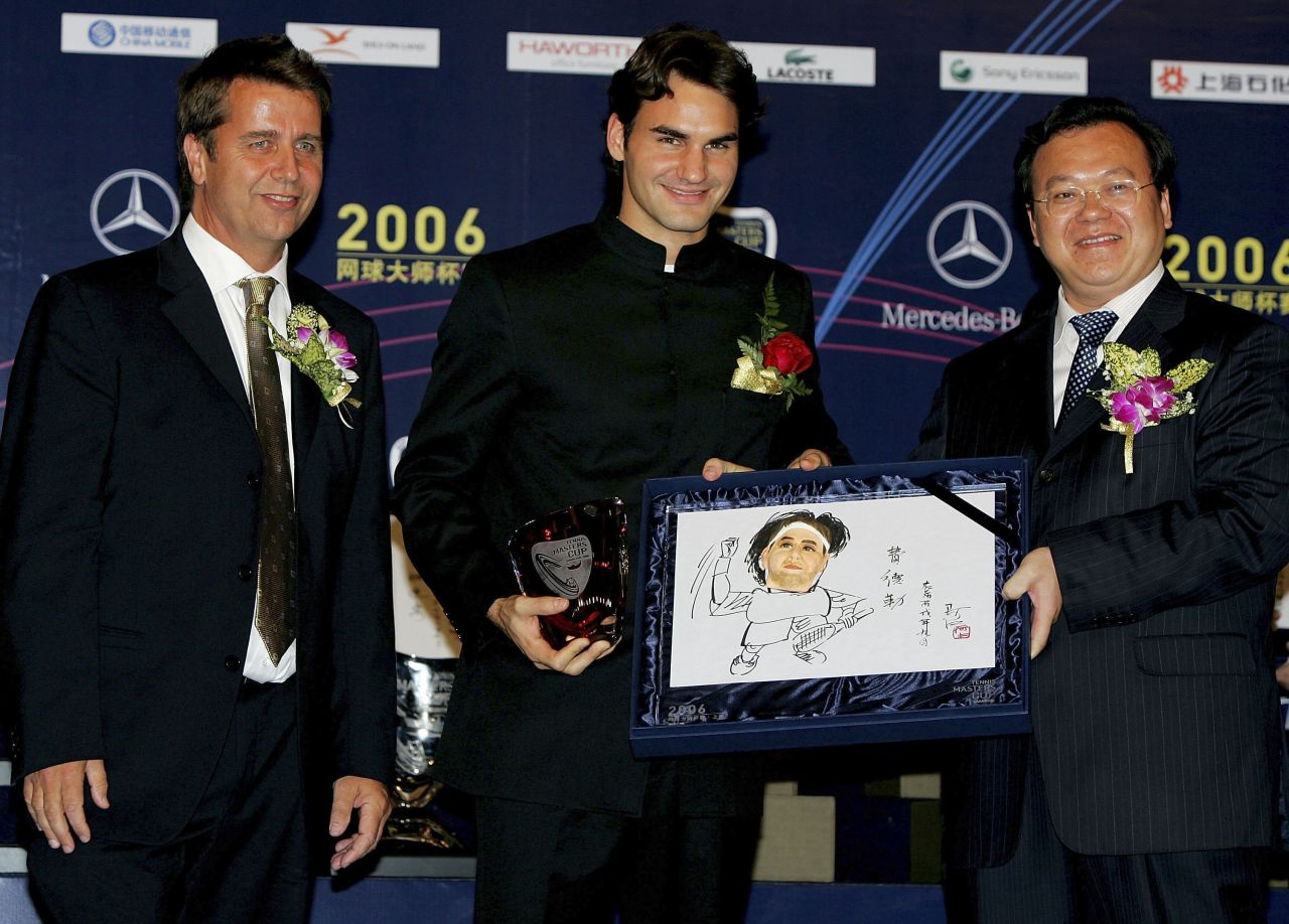 The Australian took the finals back to China in 2005. Here he is pictured with Federer and Minhang district director Chen Jing ahead of the 2006 Masters Cup in Shanghai.