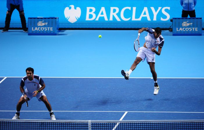 Barclays bank is the tournament's main sponsor, and Lacoste is another key partner. India's Rohan Bopanna smashes a return while doubles partner Aisam-ul-Haq Qureshi of Pakistan looks on.