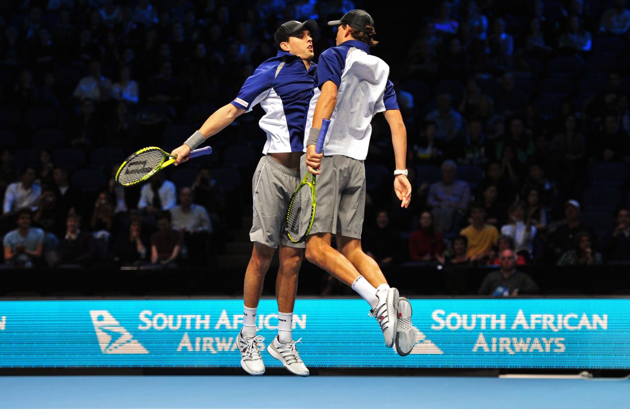 The Bryan brothers Mike, left, and Bob are top seeds in the doubles event. Here the Americans celebrate a group-stage victory with their trademark chest bump.