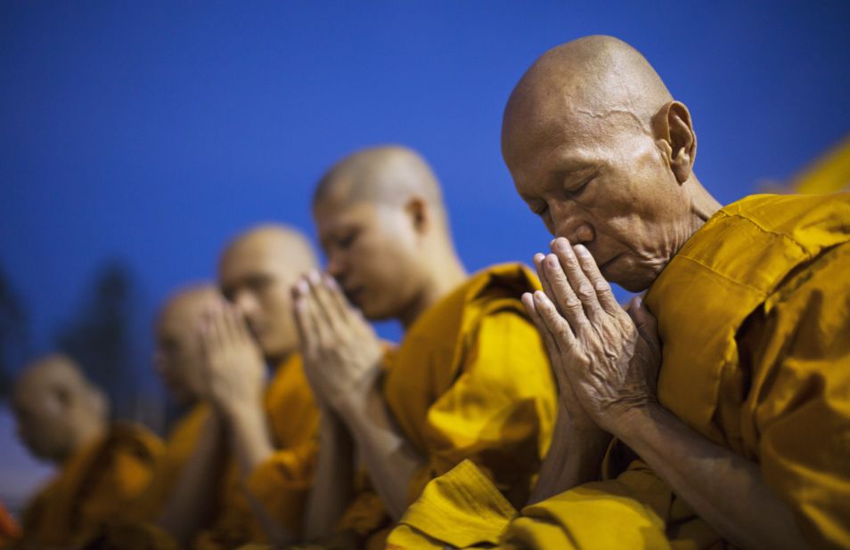 Buddhist monks offer prayers during the Maha Puja religious festival in Bangkok. Nearly 95% of Thai's are followers of the Buddhist faith, according to the CIA World Factbook.