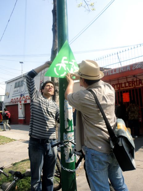 The activists are all part of a local Mexican organisation known as the "Make Your City Collective" who raised funds for the paints, brushes and stencils from a crowdsourcing site.