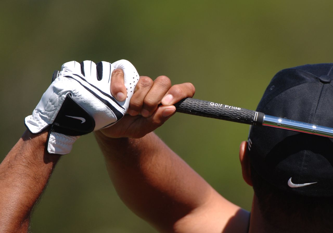 "The grip is one of the most important aspects of the swing. Most people grip the club too much in the palm of the hand, which creates tremendous tension and doesn't allow the wrist to work correctly," says golf coach David Leadbetter. "People who do this wear a hole in their glove. It's important to hold the club out towards the fingers, not the palm. It helps more golfers than you can believe."