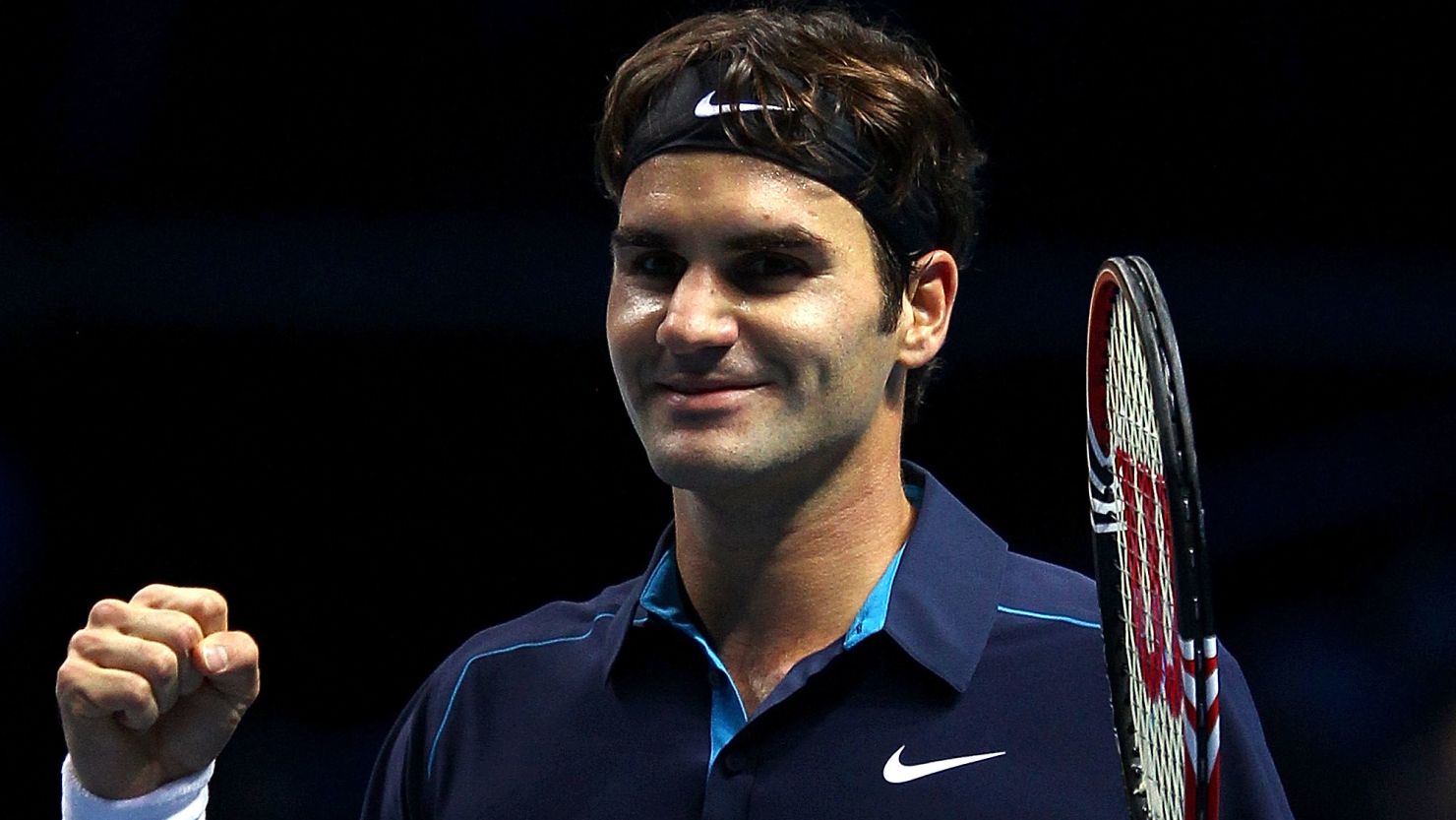 Swiss tennis star Roger Federer celebrates reaching the ATP World Tour Finals title match.