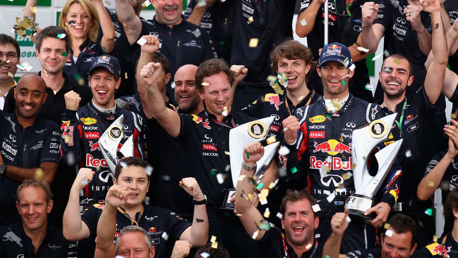 World champion Sebastian Vettel and Brazil GP winner Mark Webber celebrate their 2011 success.