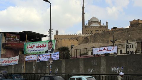 Electoral campaign banners are seen on a fence near Mohammed Ali mosque in Cairo on Sunday.