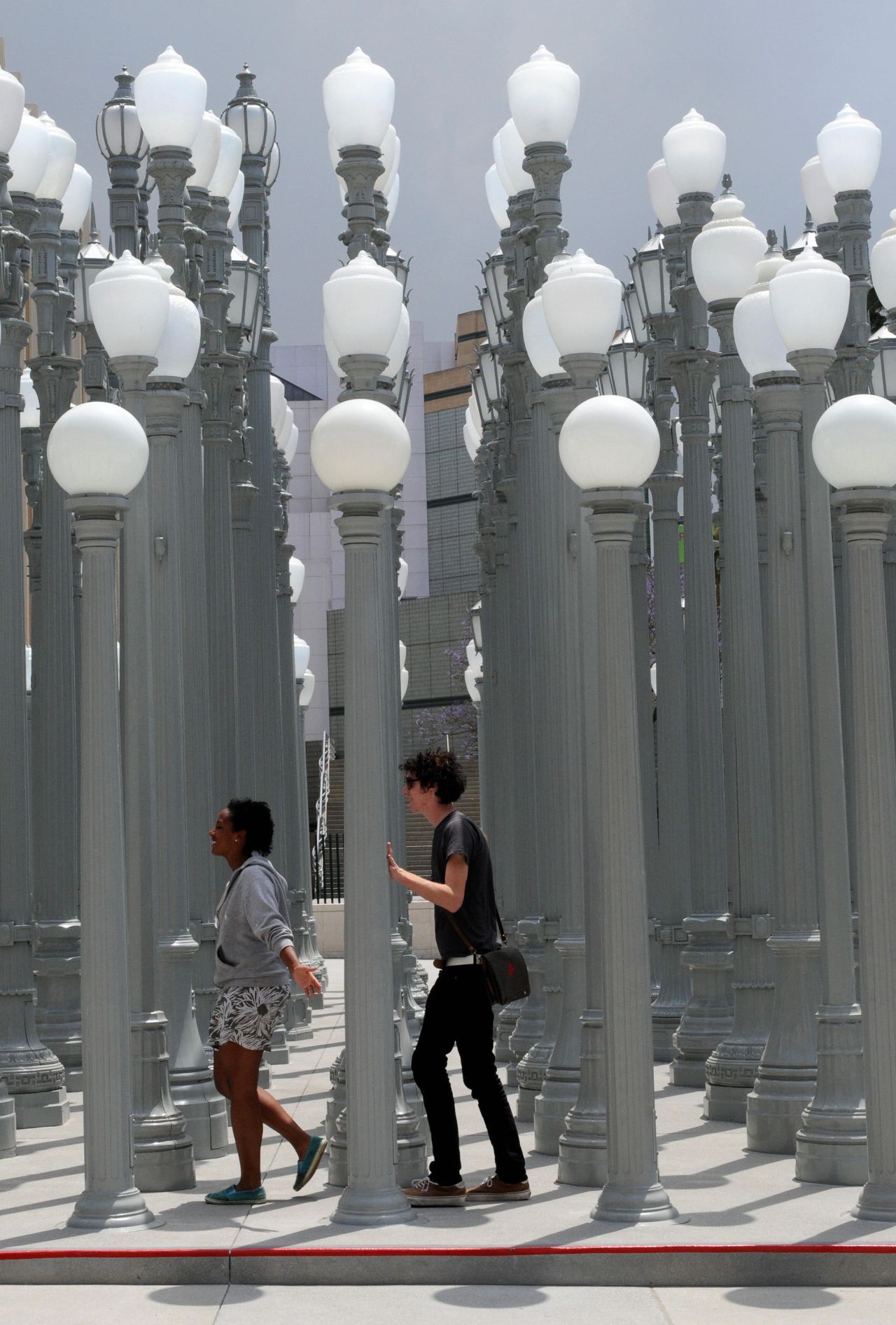 'Urban Light', 202 cast-iron streetlamps restored by LA artist Chris Burden, in front of the LACMA museum in Los Angeles. 