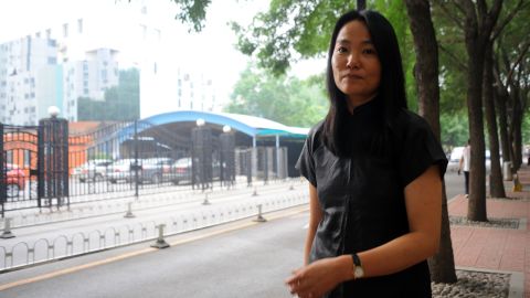 Lu Qing, the wife of Chinese artist Ai Weiwei, has been told she must not leave Beijing after being questioned by police.