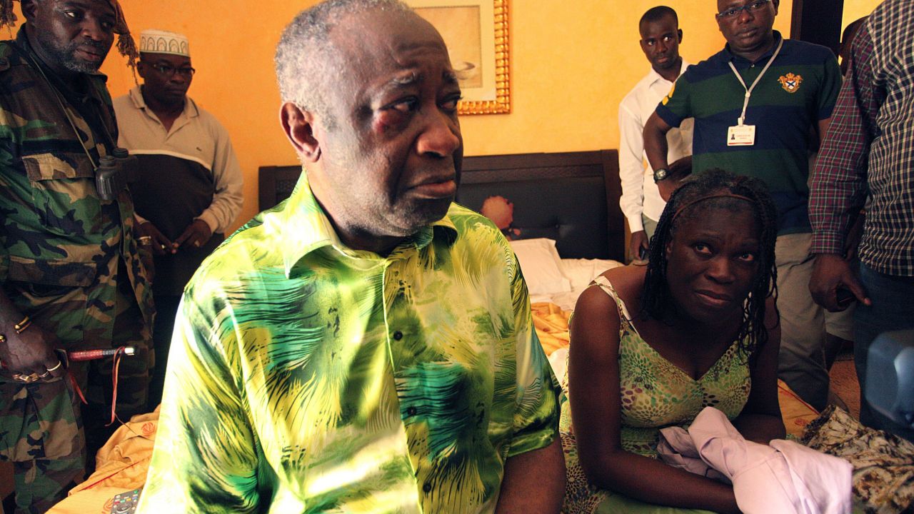 A photo taken on April 11 shows Ivory Coast strongman Laurent Gbagbo and his wife Simone after their arrest. 