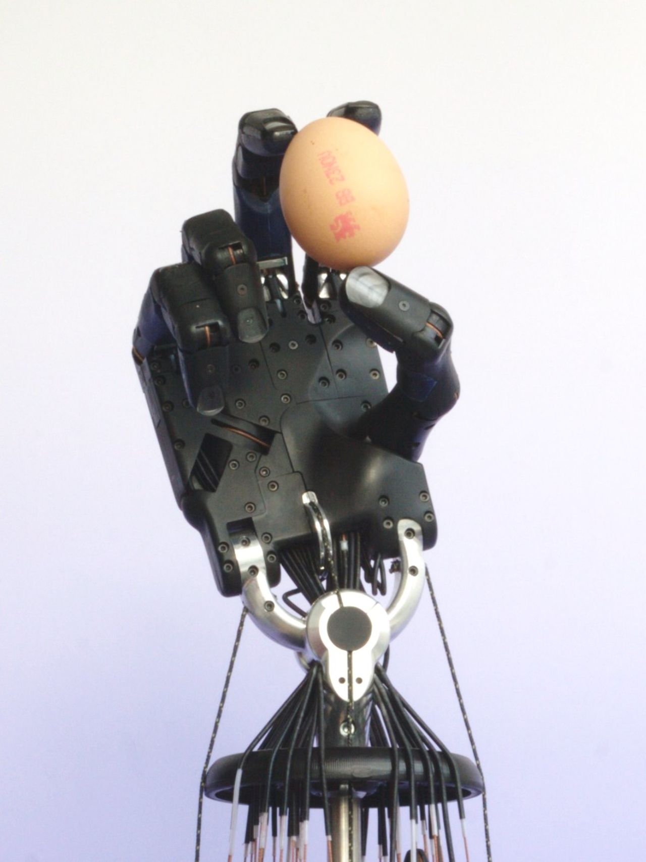 The "Shadow Dexterous Hand" is the work of the Shadow Robot Company. It says the mechanized hand can mimic all the movements of a human hand and can be fitted to various robots.