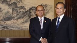 Myanmar president Thein Sein (L) stands with Chinese Premier Wen Jiabao in Beijing on May 27, 2011.