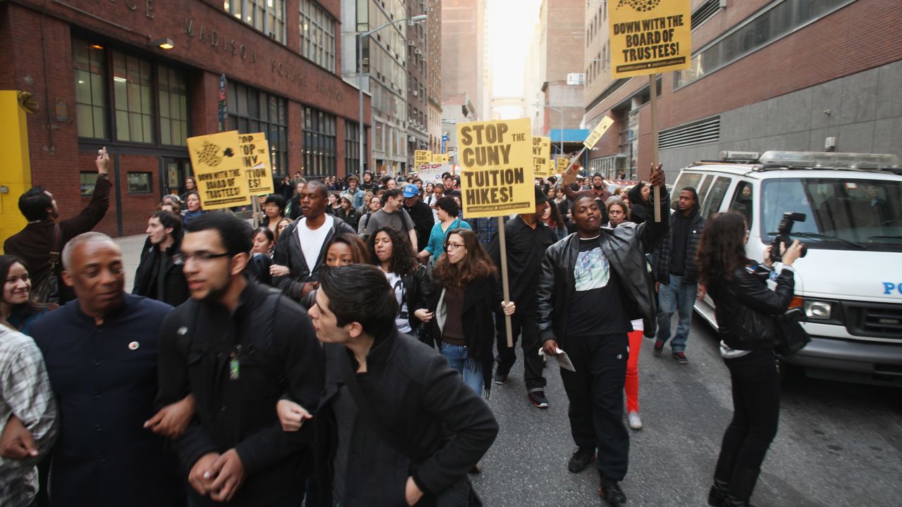  Demonstrators, joined by members of the Occupy Wall Street movement, march near Baruch College to protest proposed tuition increases at CUNY on November 28 in New York.