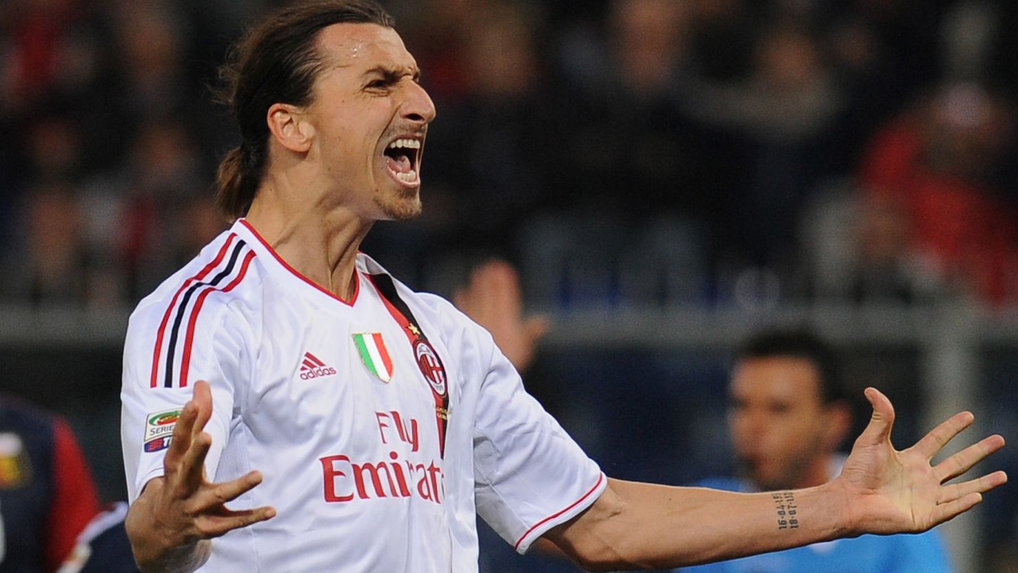 Zlatan Ibrahimovic celebrates after scoring AC Milan's opening goal at Stadio Luigi Ferraris on Friday.