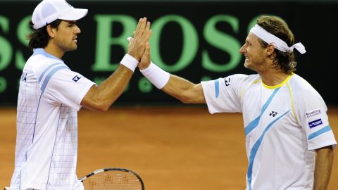 Argentina's David Nalbandian (right) and Eduardo Schwank coasted to doubles victory in the Davis Cup on Saturday
