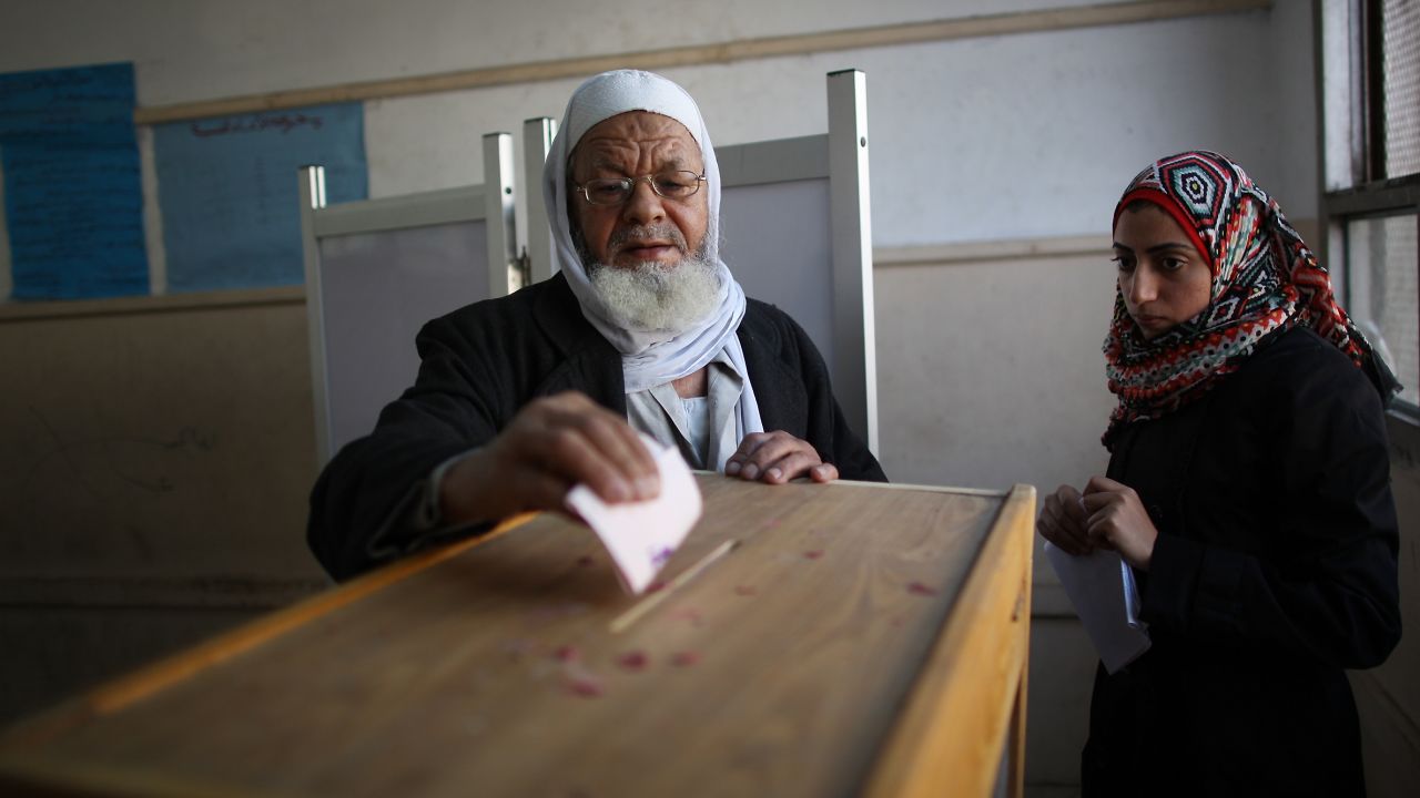 An Egyptian man votes on November 29 in the country's first elections since the fall of longtime President Hosni Mubarak.