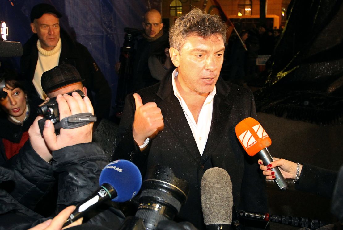 Russian opposition leader Boris Nemtsov speaks with journalists in 2011. 