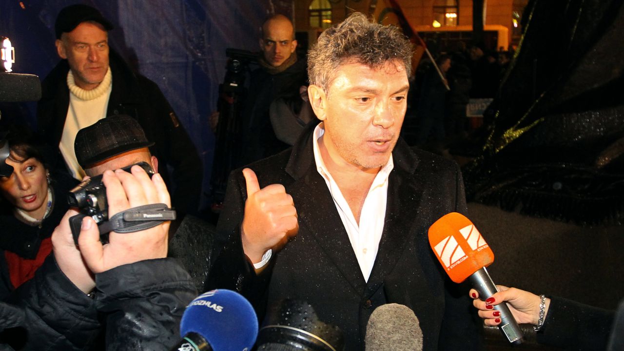 Russian opposition leader Boris Nemtsov speaks with journalists in 2011.