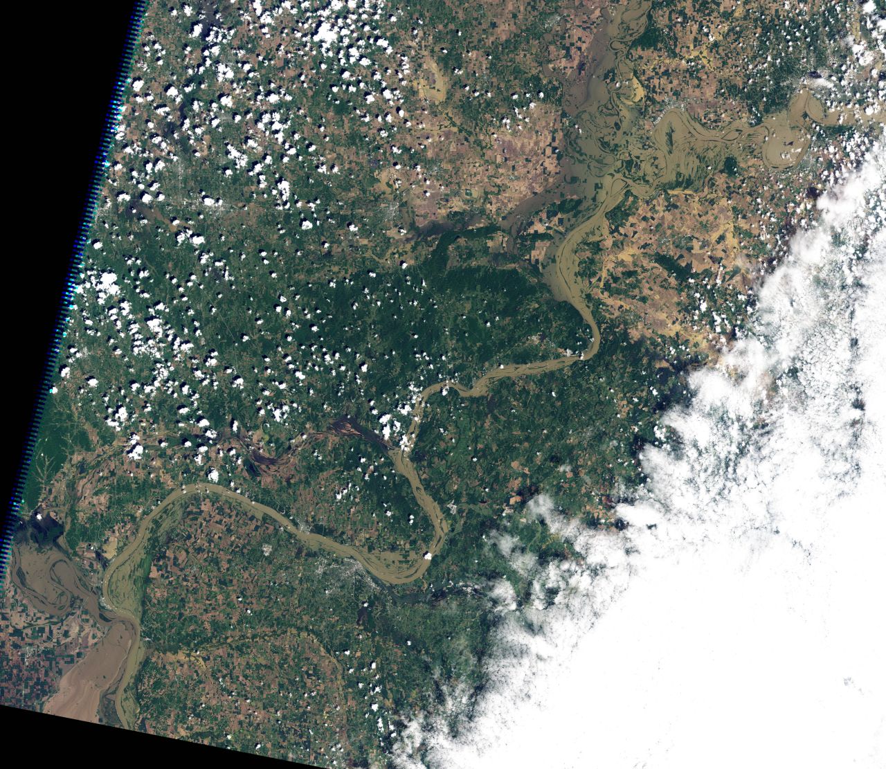 The<a href="http://edition.cnn.com/2011/US/05/21/flooding/index.html"> flooded outline</a> of the Mississippi River can be seen meandering into the left edge of this NASA image, with the Ohio River snaking north and east. Parts of the Mississippi experienced its worst floods since 1933 according to the WMO.   
