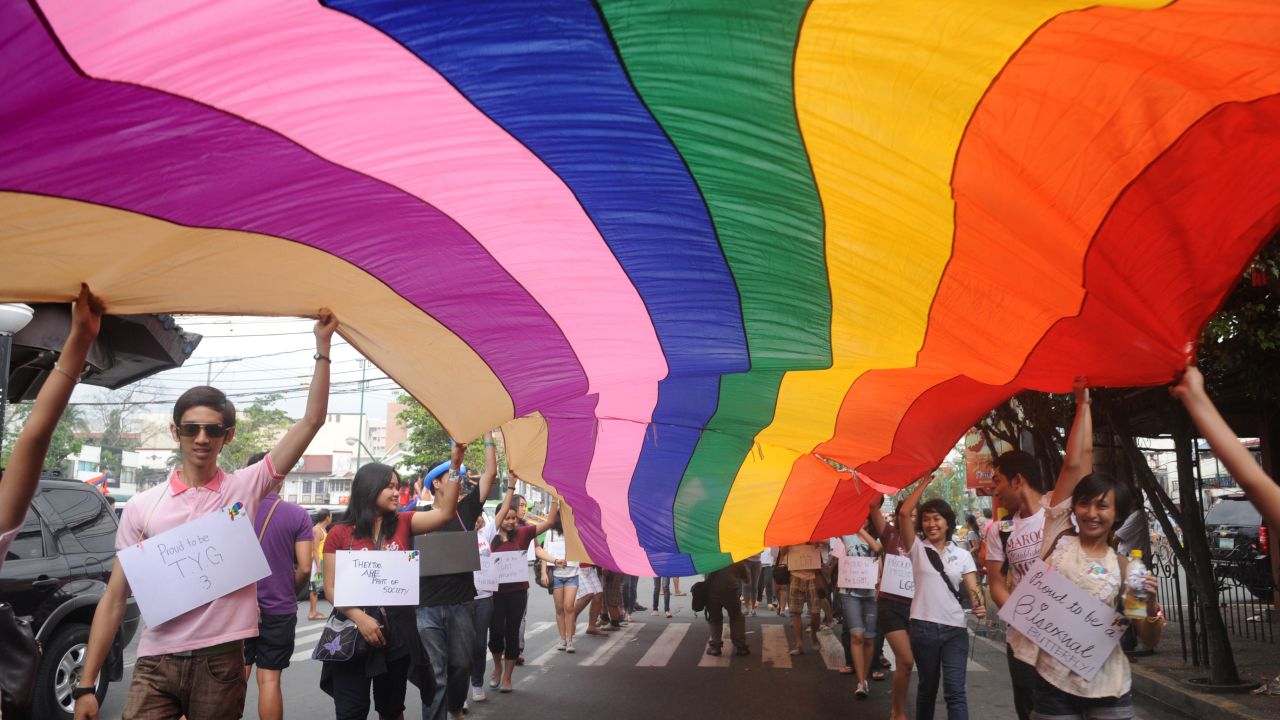 Supporters take part in an annual gay pride march in Manila, Philippines. Saturday is Human Rights Day.