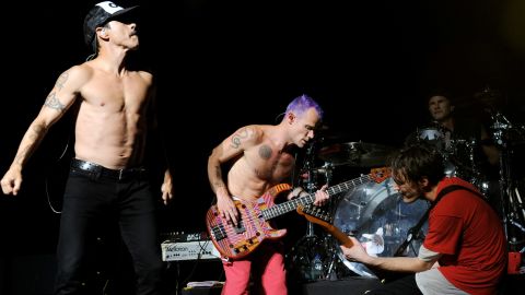The Red Hot Chili Peppers, shown here performing at a benefit in August, were inducted into the Rock and Roll Hall of Fame.