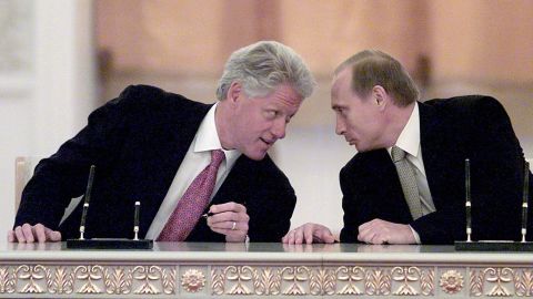 US President Bill Clinton and Russian President Vladimir Putin talk after signing a memorandum at the Kremlin on June 4, 2000, in Moscow.