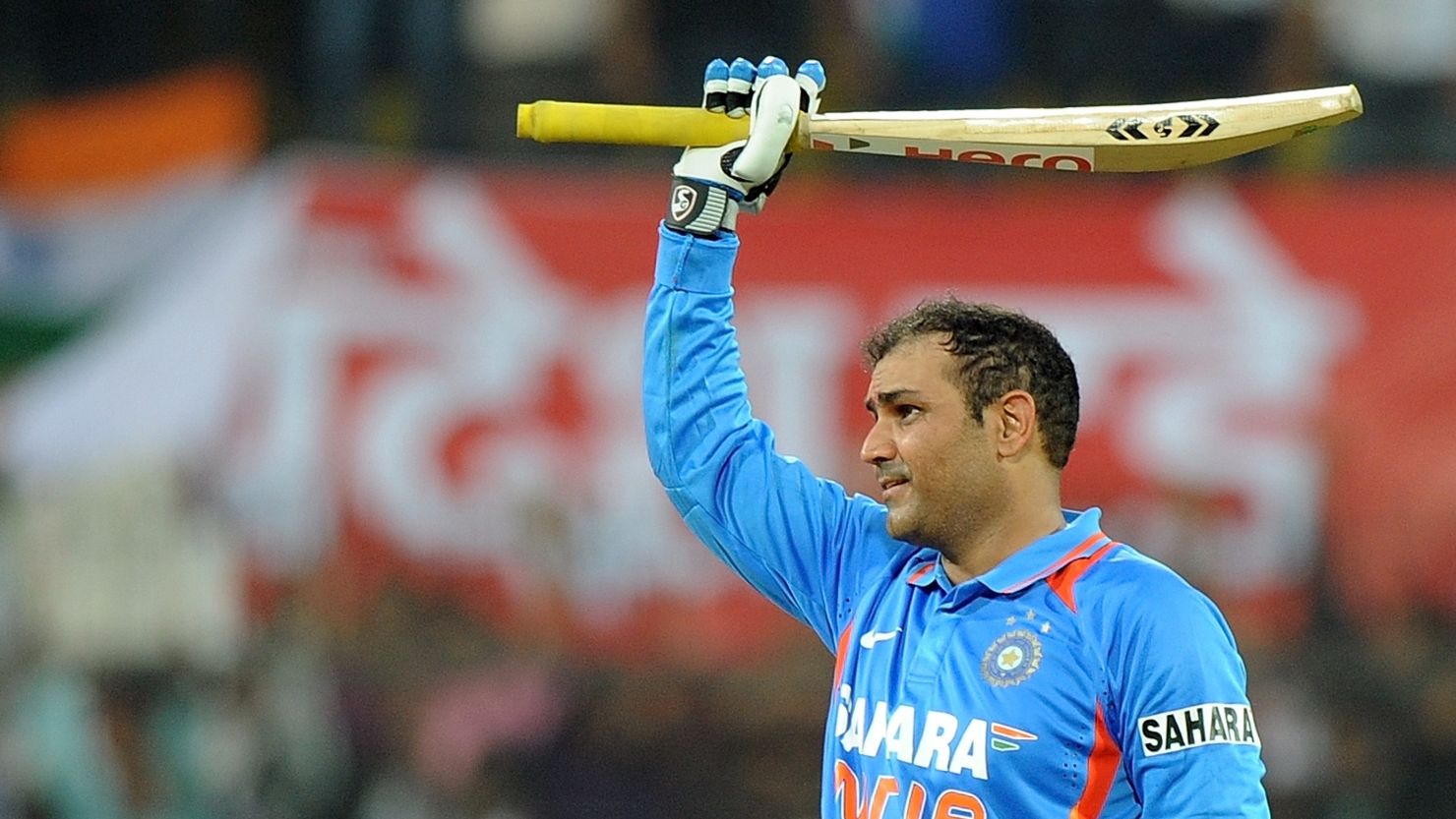 Virender Sehwag celebrates his record double hundred in the one-day international against West Indies.