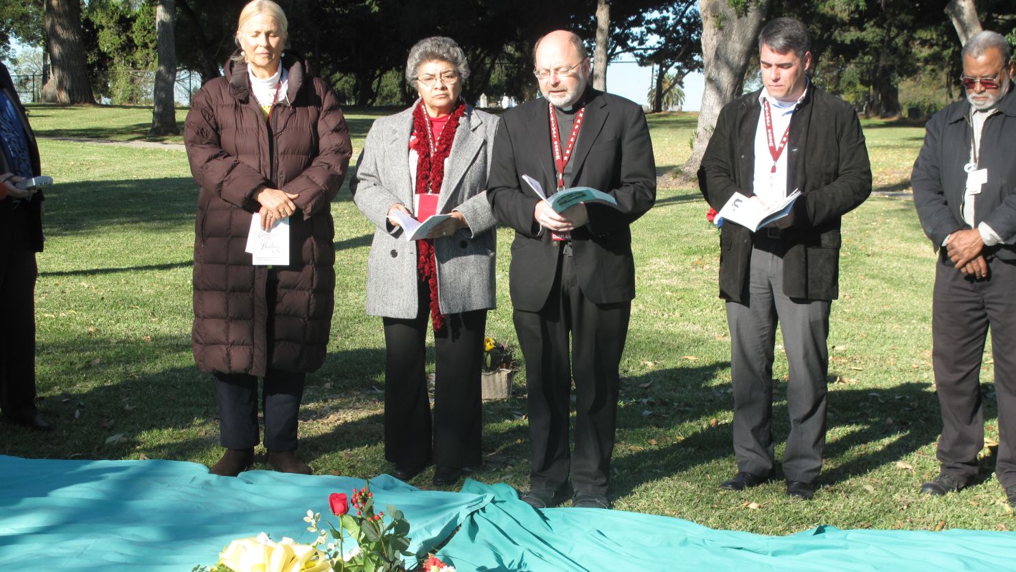Clergy members offer blessings Wednesday for the unclaimed, cremated remains of 1,639 people who died in 2008.