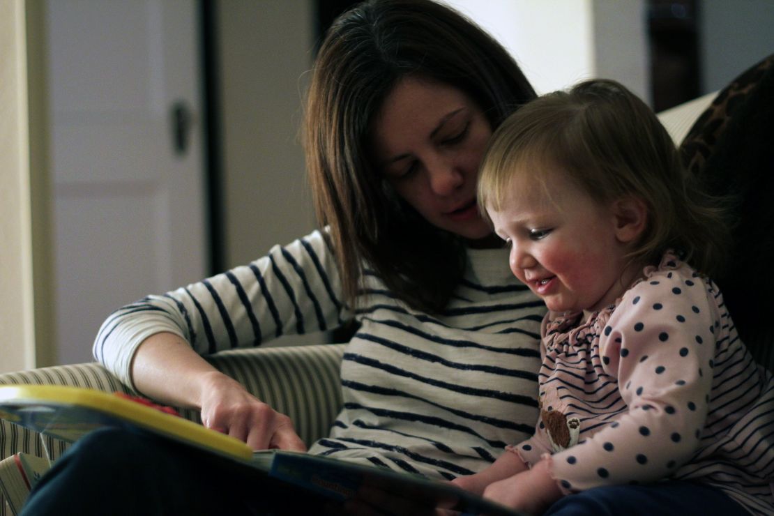 Rosenblatt's wife, Alexandra, and their daughter, Harper, read a book together. 