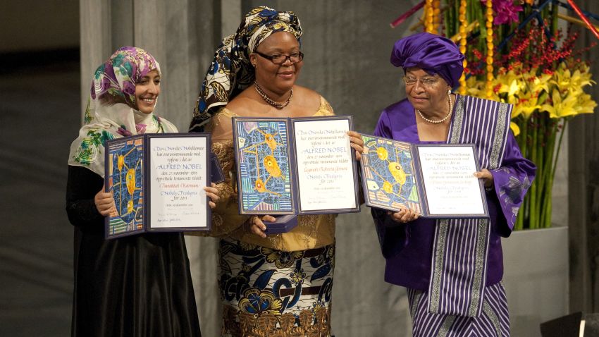 The 2011 Nobel Peace Prize laureates, Liberian President Ellen Johnson Sirleaf (R), Liberian peace activist Leymah Gbowee (C) and Yemeni activist Tawakkol Karman (L) pose on December 10, 2011 