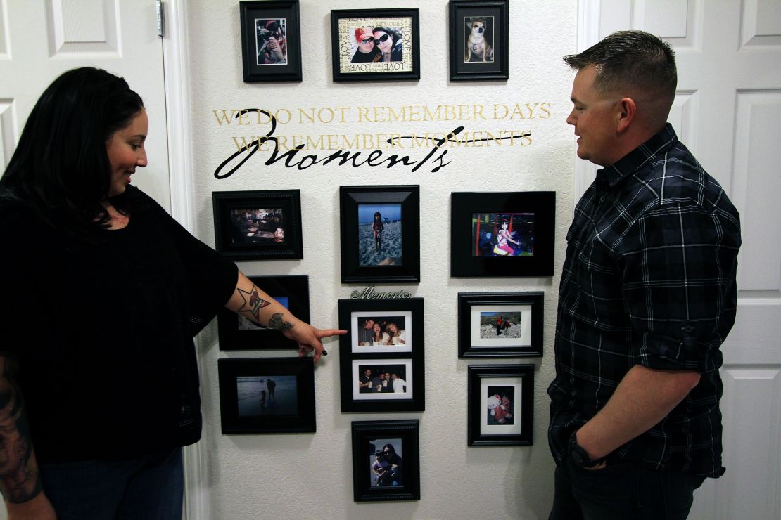 A  wall of photos at their home in Fort Bliss, Texas, shows the evolution of the relationship of Raquel and Nathan Dukellis.