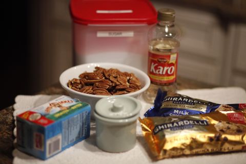 Butter, light corn syrup, sugar, salt, pecans and chocolate are the simple ingredients behind dazzling English toffee.