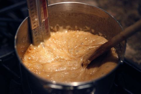 The toffee will start to turn caramel just  before it reaches 310 degrees.