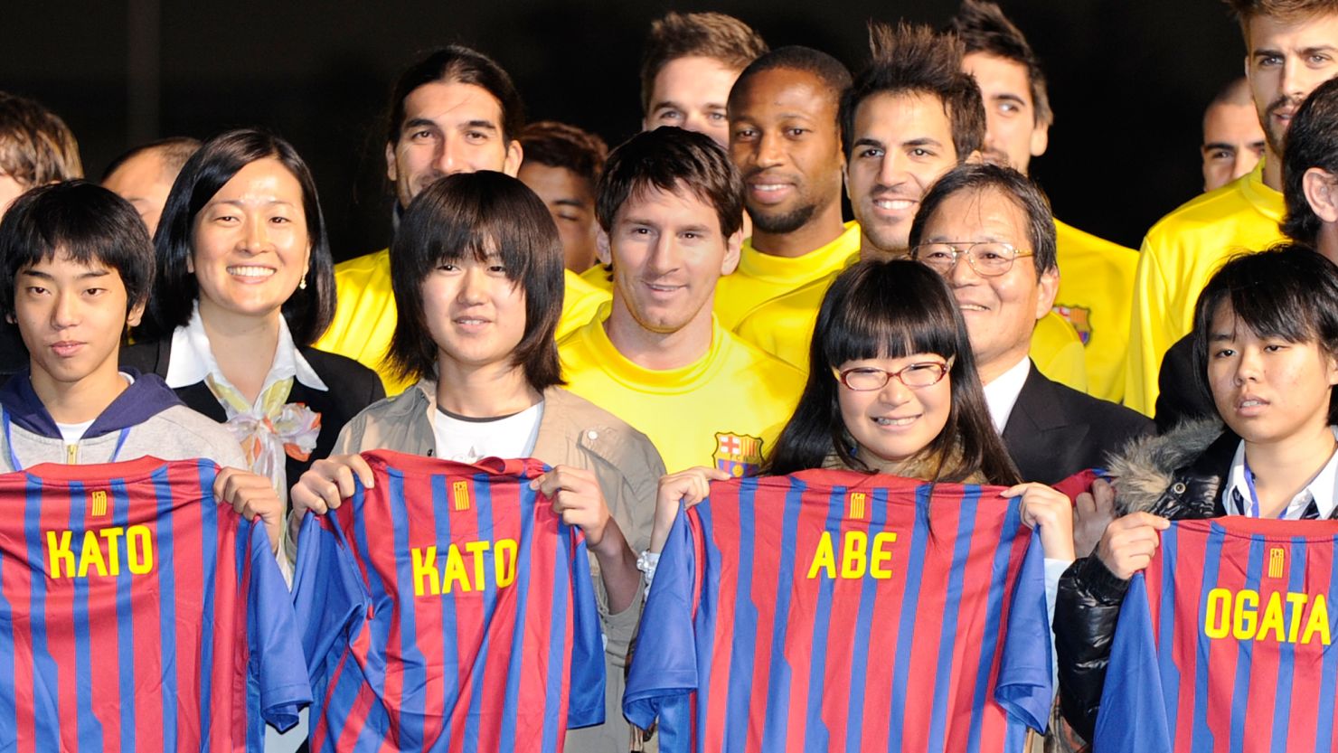 Stars from Spanish and European champions Barcelona meet victims affected by Japan's tsunami in Yokohama.