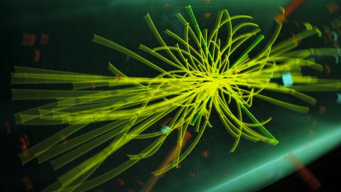 This graphic shows traces of the collision of particles from an experiment at the Compact Muon Solenoid (CMS) -- a large particle detector in Geneva. The Standard Model of particle physics lays out the basics of how elementary particles and forces interact in the universe. But the theory crucially fails to explain how particles actually get their mass. Particles, or bits of matter, range in size and can be larger or smaller than atoms. Electrons, protons and neutrons, for instance, are the subatomic particles that make up an atom. Scientists believe that the Higgs boson is the particle that gives all matter its mass.