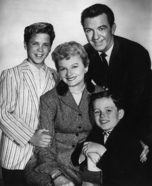 The story of the family Cleaver -- along with "Father Knows Best" and "The Donna Reed Show" --  debuted in the 1950s. The shows presented a suburbia of cheerful working fathers, pearl-and-apron-bedecked mothers and mischievous children, all living in happy modern towns away from the city.