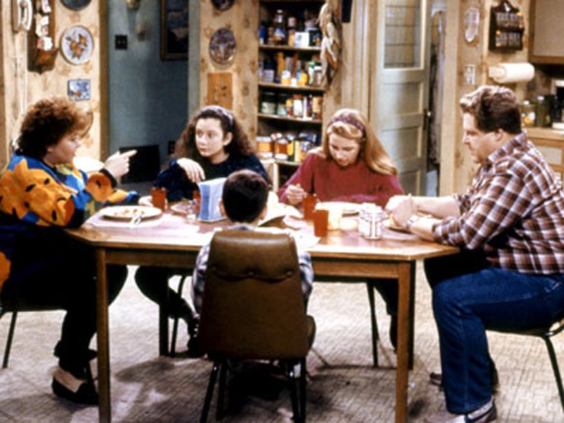 Like the real thing, TV suburbs weren't always spotless and upscale. In this top-rated series starring comedian Roseanne Barr, the family lived in the fictional working-class Chicago suburb of Lanford, Illinois, in a mildly unkempt house, struggling to get by.