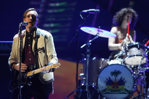 Though the group's Win Butler cast the Grammy-winning album as a nonjudgmental "letter from the suburbs," the video for the title song shows suburbia in a more negative light, with aimless teenagers growing violent amid a mysterious military presence.