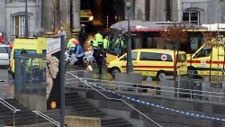 Ambulances and police are parked on the Place Saint-Lambert in Liege as a medical team arrives in the area after a gunman attack on December 13, 2011. A lone gunman was behind today deadly attack on a city square crowded with children and Christmas shoppers in the Belgian town of Liege, the public prosecutor said. 