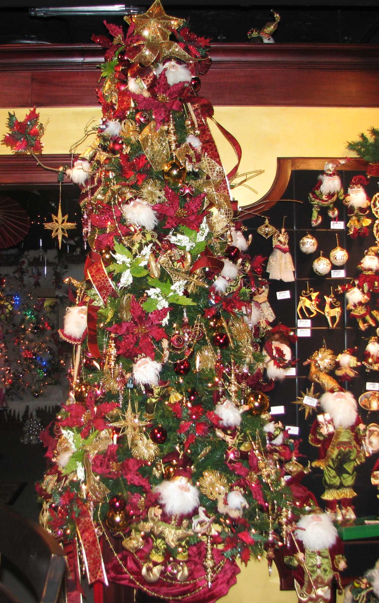 Experiement with different shades of traditional themes, like this burgundy and gold tree.