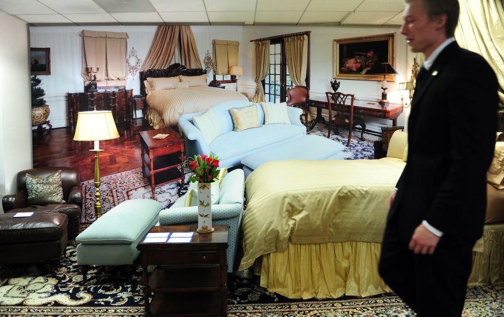 The auction house's recreation of the bedroom where Jackson died. The nightstand seen next to the death bed in coroner's photos, bearing numerous bottles of sedatives and other drugs, is for sale. The "French occasional table" is listed for between $300 and $500.