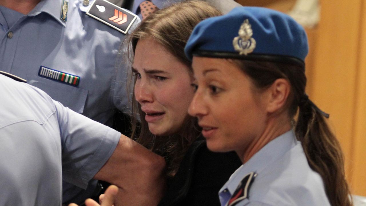 Knox breaks into tears as she leaves the court after being acquitted on October 3, 2011, for Kercher's murder.