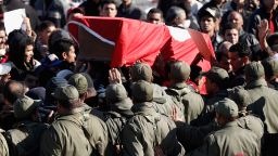 Protesters carry a coffin draped in the Tunisian flag representing martyr Mohamed Bouazizi on January 24, 2011 in Tunis, Tunisia. 