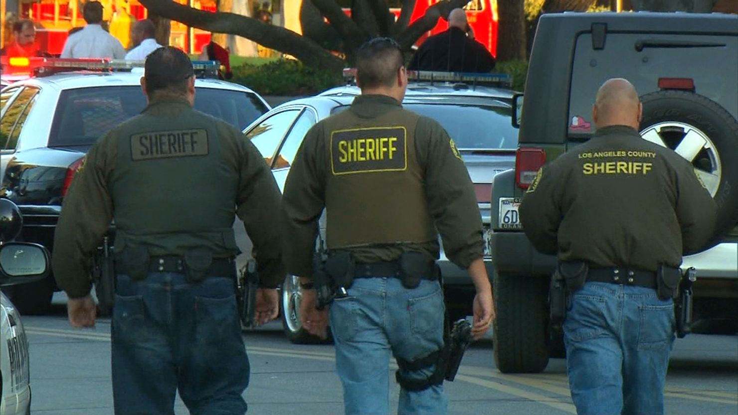 Officers arrive at the scene of the shooting in Irwindale, California.