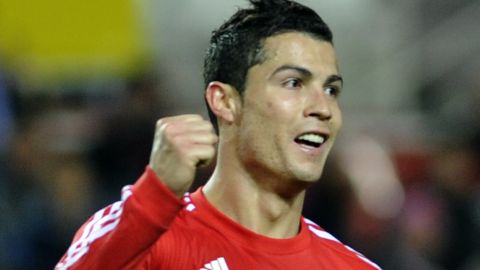Real Madrid's Cristiano Ronaldo celebrates after scoring one of his three goals at Sevilla's Ramon Sanchez Pizjuan stadium.