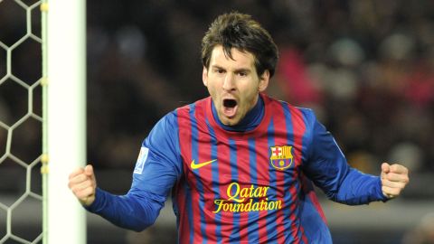 Lionel Messi celebrates after scoring for Barcelona in their 4-0 win over Santos in Yokohama.